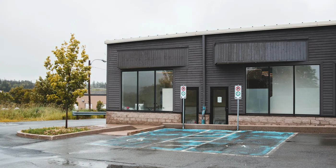 Single-storey commercial storefront with large glass windows